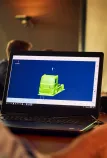 Meeting with the design team, with a 3D truck on a screen